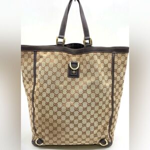 Gucci Tan and Brown monogram Signature tall Tote authentic  bag